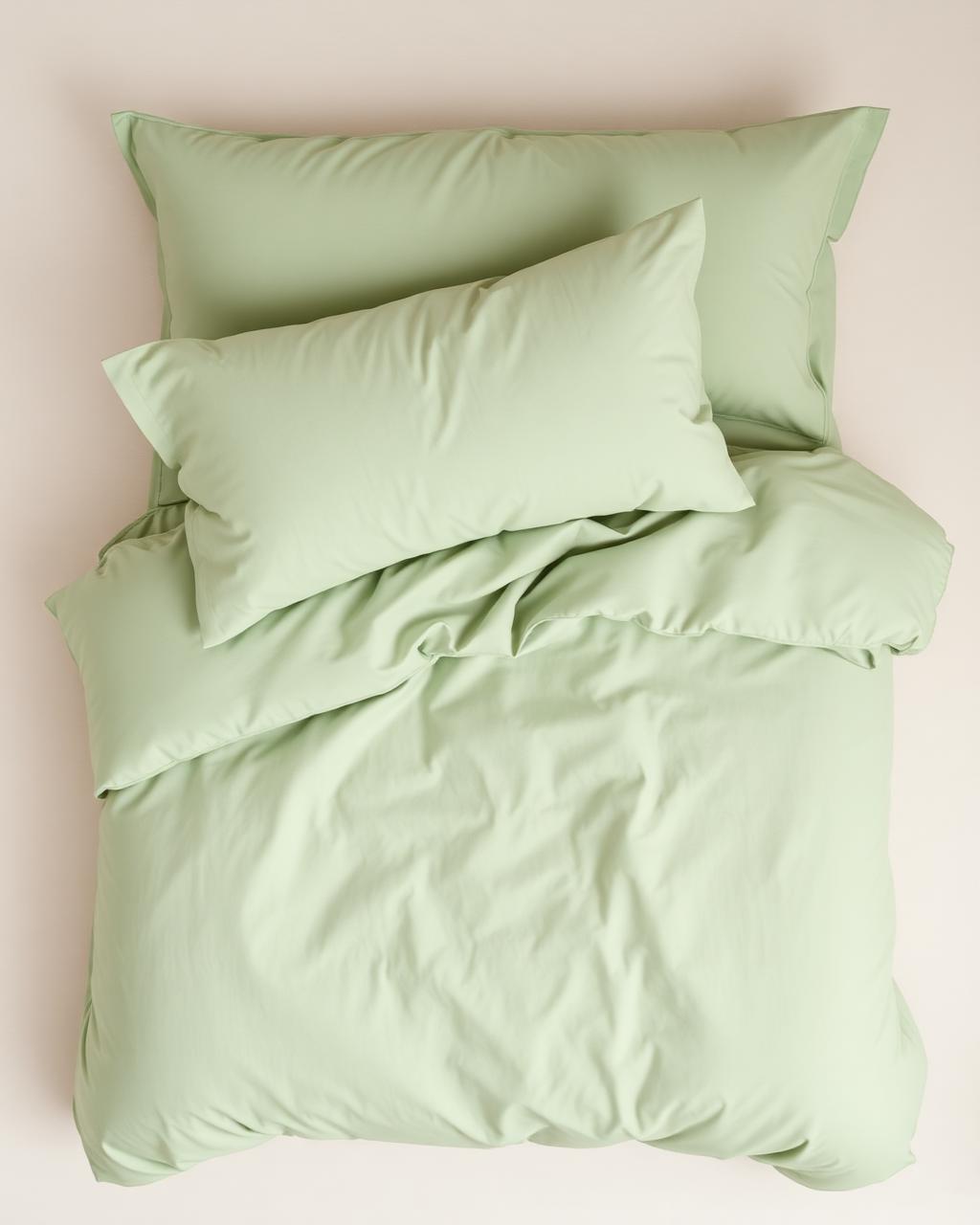 Percale sage duvet flat lay